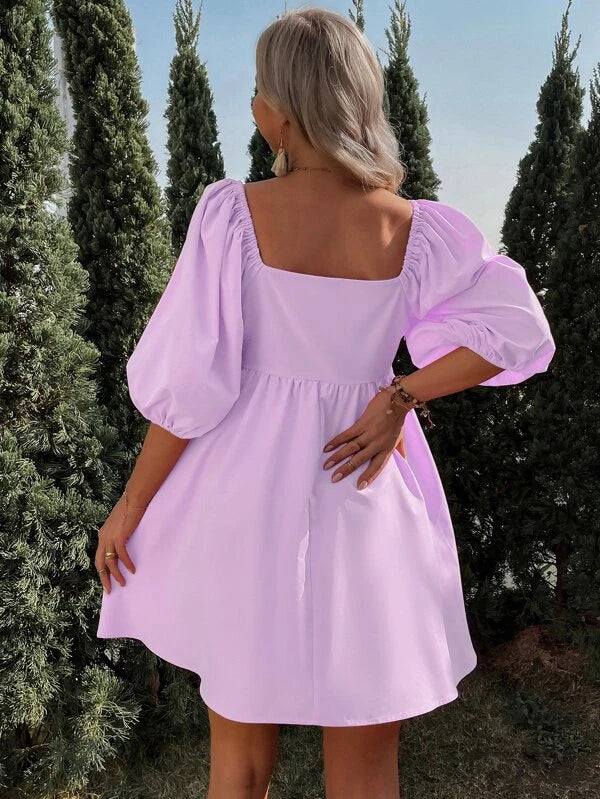 Robe élégante à manches bouffantes