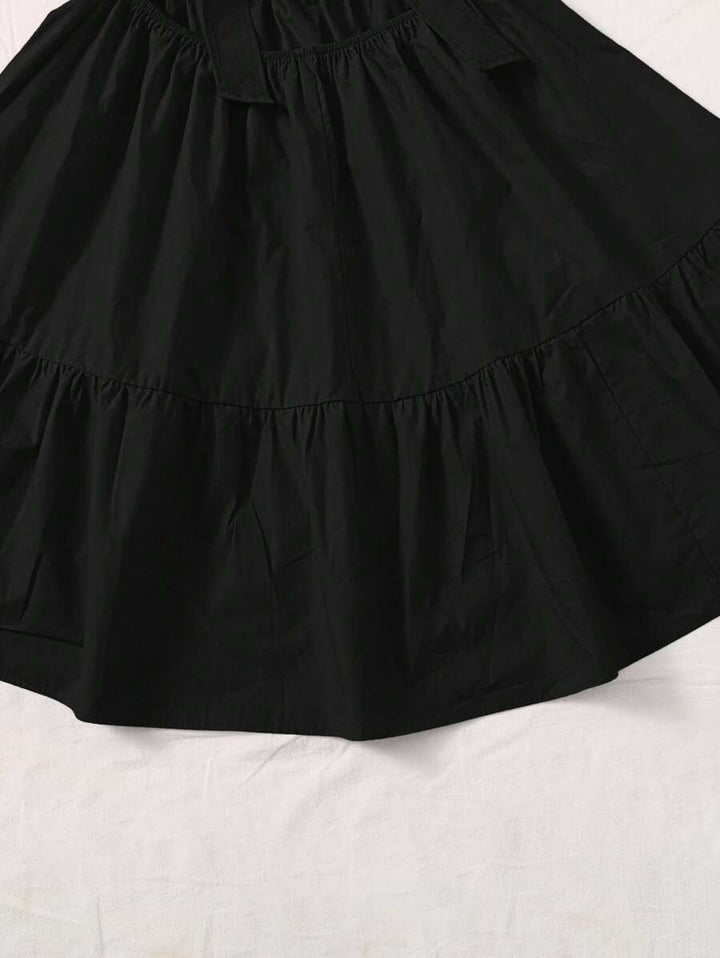 Kleid mit quadratischen Puffärmeln und Rüschensaum 