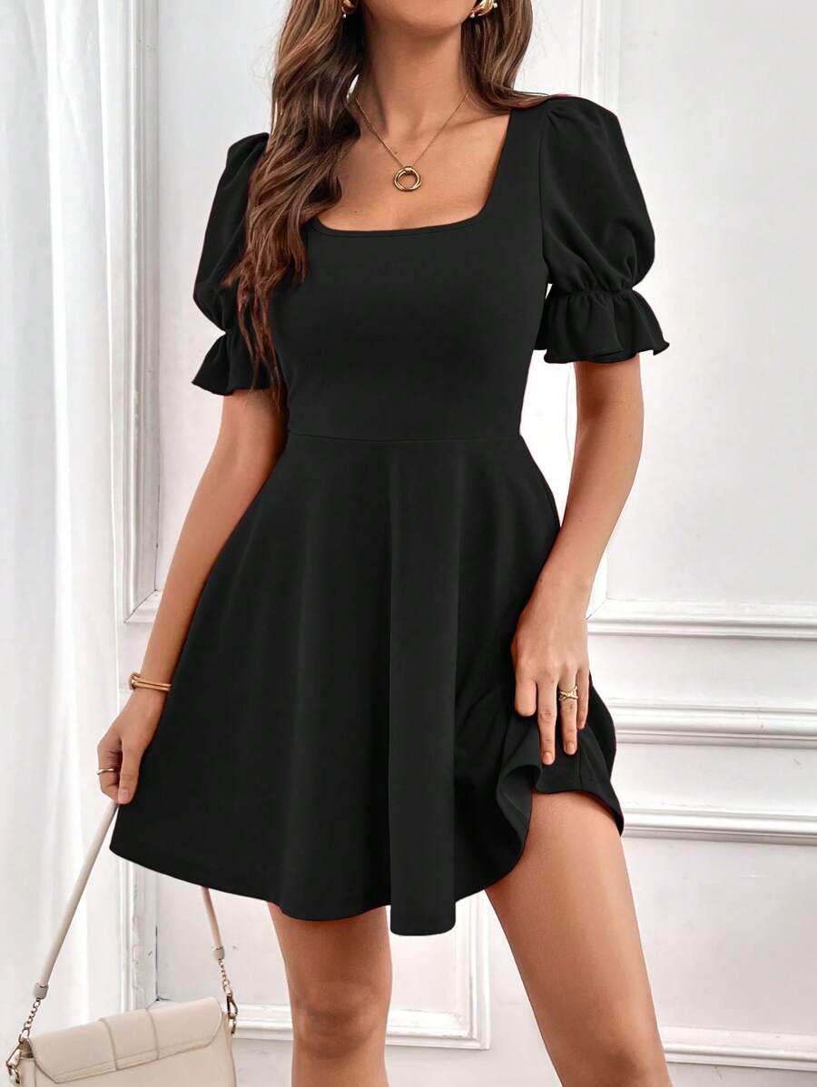 Robe élégante à manches bouffantes