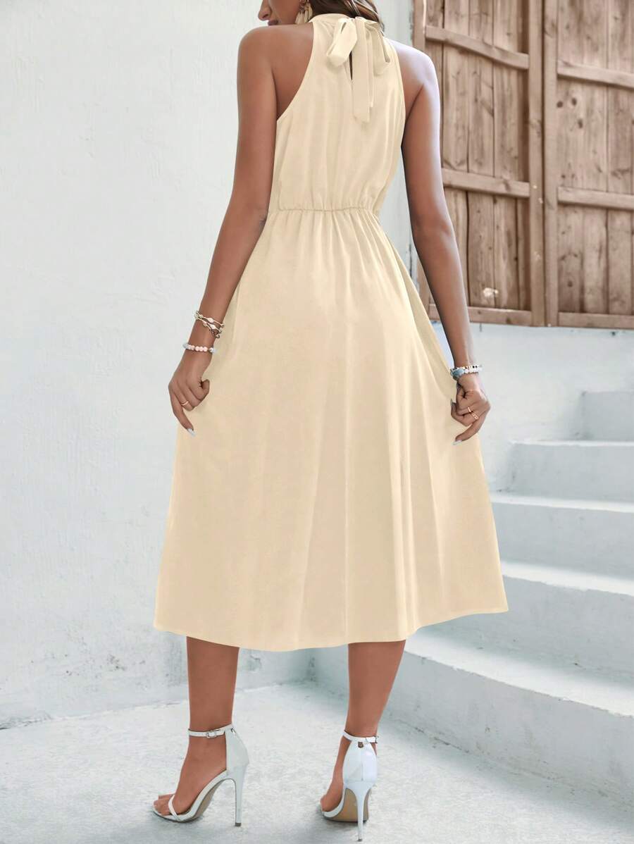 Barbie Keyhole Asymmetrical Wrap Hem Halter Dress