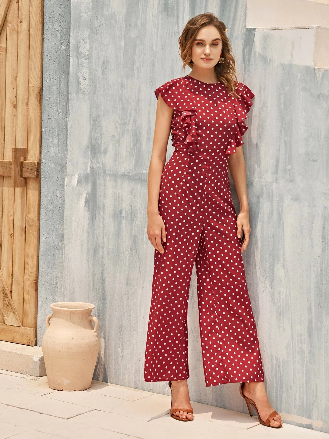 Gepunkteter Palazzo-Jumpsuit mit gerüschtem Armloch