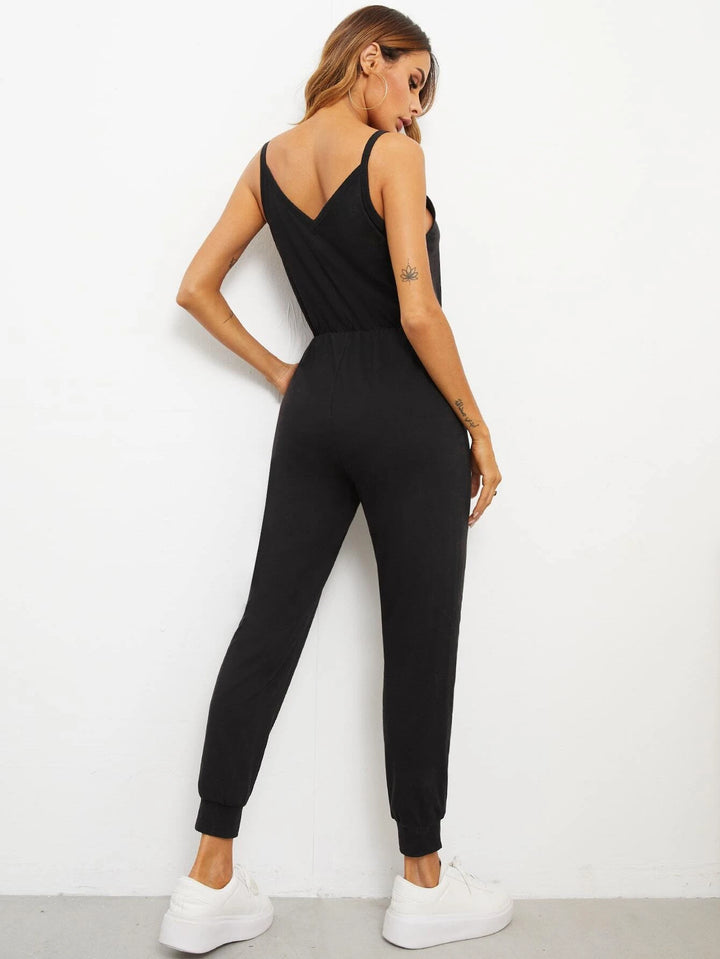 Slip-Jumpsuit mit Knopfleiste vorne und schrägen Taschen