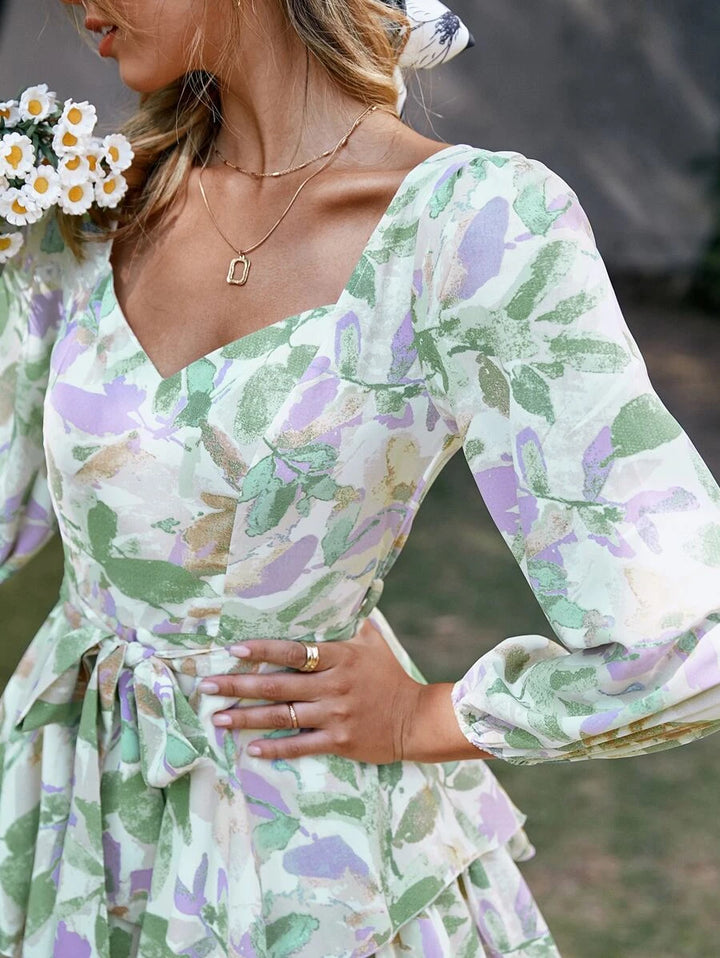 Simplee Floral Print Lantern Sleeve Belted Layered Ruffle Romper