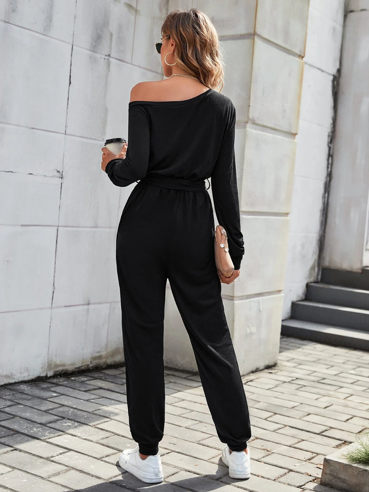 Solid Coloured Asymmetrical Neck Belted Jumpsuit