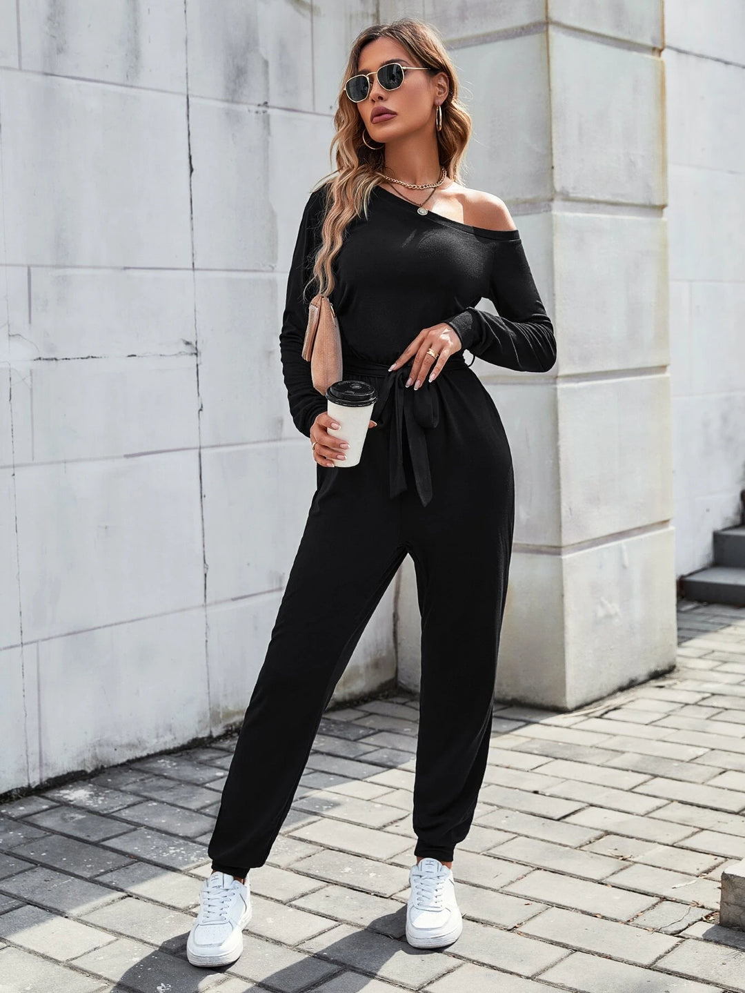 Solid Coloured Asymmetrical Neck Belted Jumpsuit