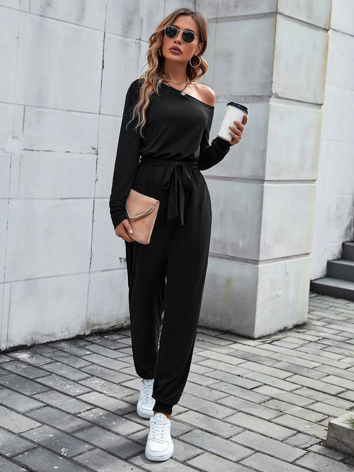 Solid Coloured Asymmetrical Neck Belted Jumpsuit