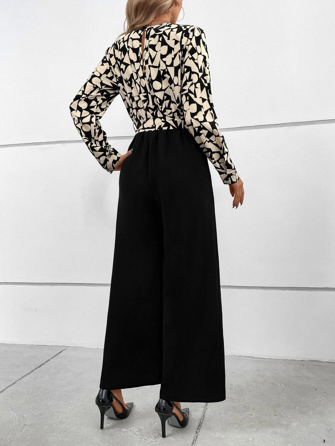 Graphic Print Surplice Neck Belted Jumpsuit