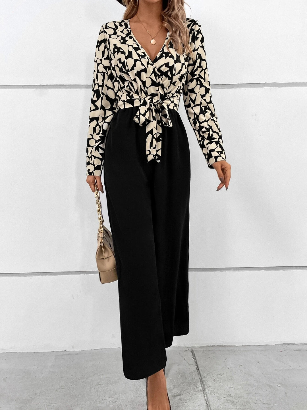 Graphic Print Surplice Neck Belted Jumpsuit