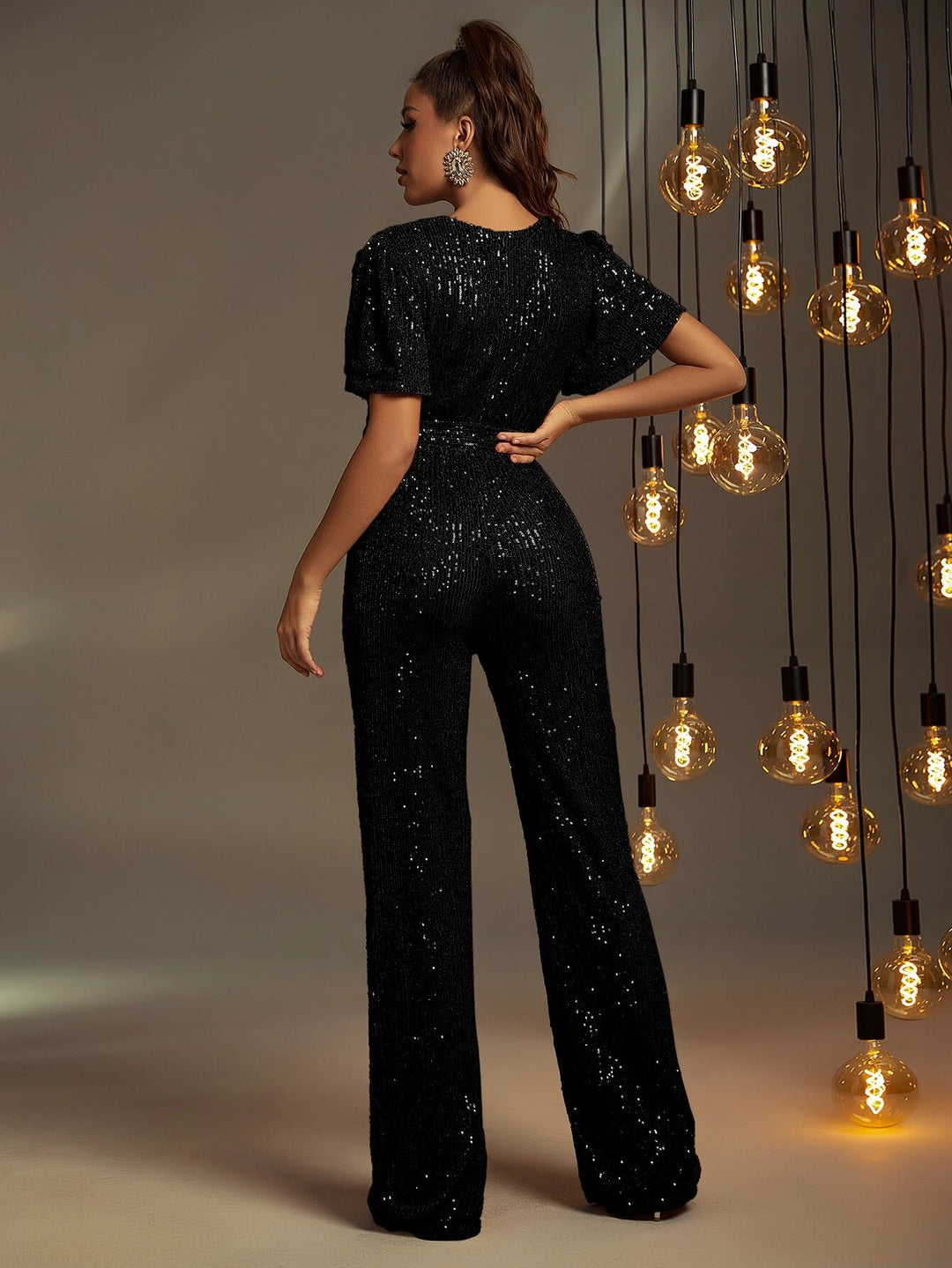 Jumpsuit mit Schmetterlingsärmeln und Gürtel