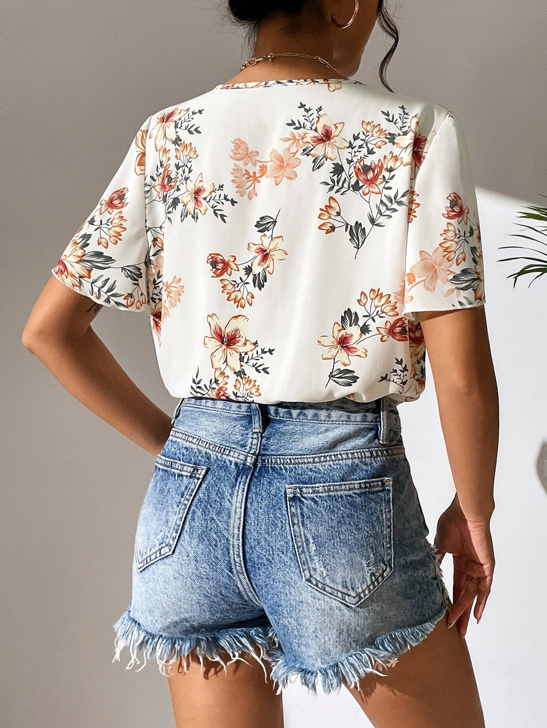 Floral Print Surplice Neck Butterfly Sleeve Bodysuit