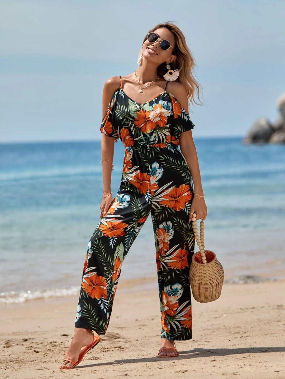 Schulterfreier Jumpsuit mit tropischem Print 